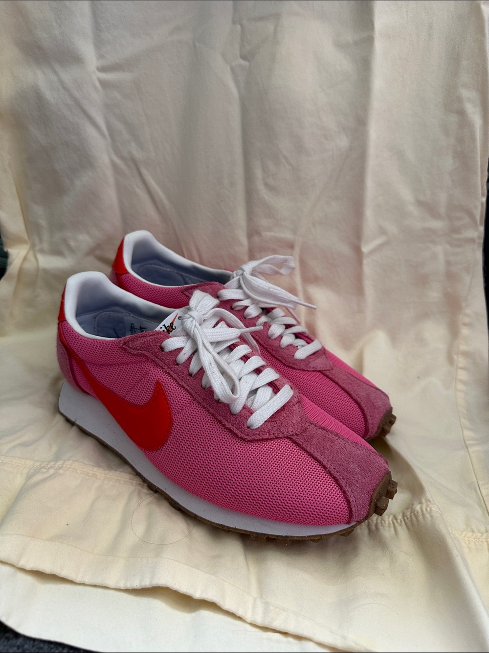 Nike Pink Retro Runner Sneakers with Red Swoosh